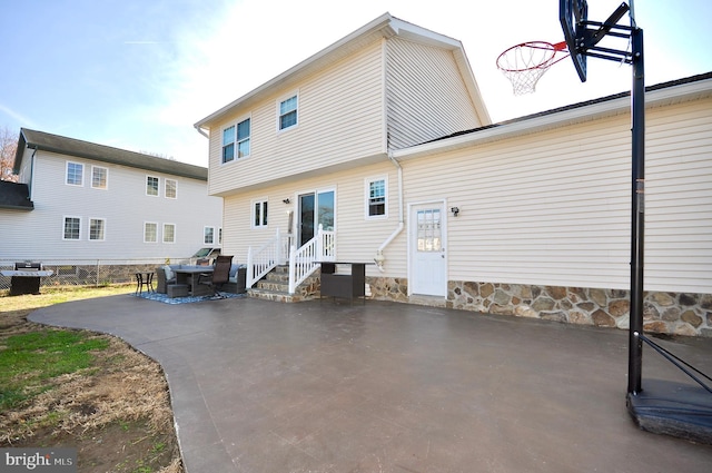 back of property with a patio area