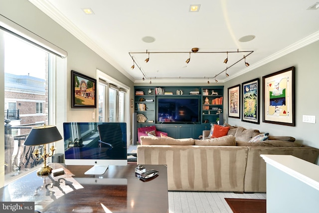 living room with light hardwood / wood-style flooring and ornamental molding