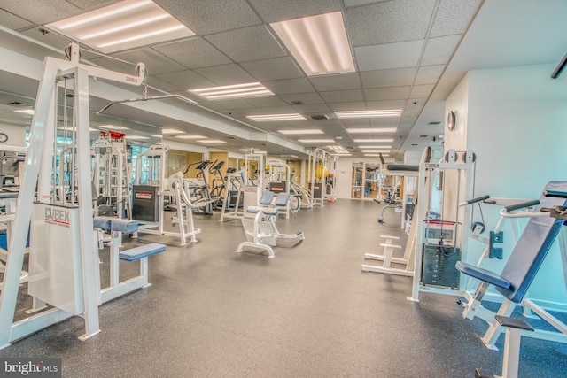 workout area with a drop ceiling