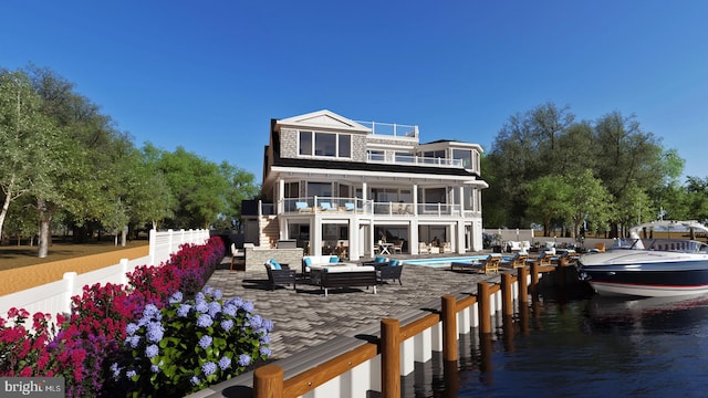 168-F Long Bch, Long Beach Township, NJ 08008 - back of property with a balcony, a patio, an outdoor living space, stairway, and a water view