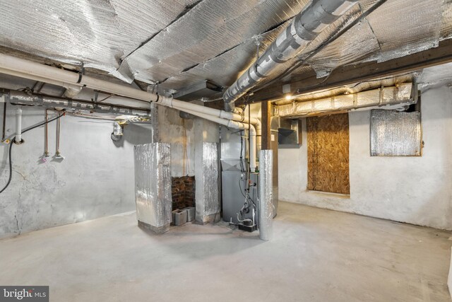 unfinished basement with heating unit