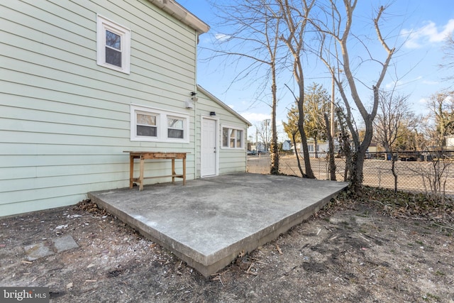 view of patio featuring fence