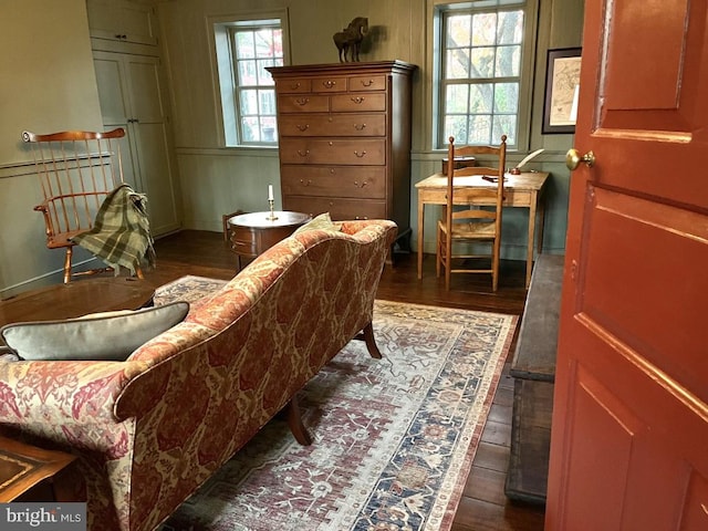 sitting room with dark hardwood / wood-style floors