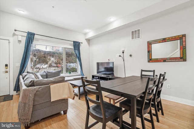 dining area featuring light hardwood / wood-style floors