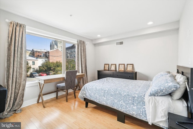 bedroom featuring wood-type flooring