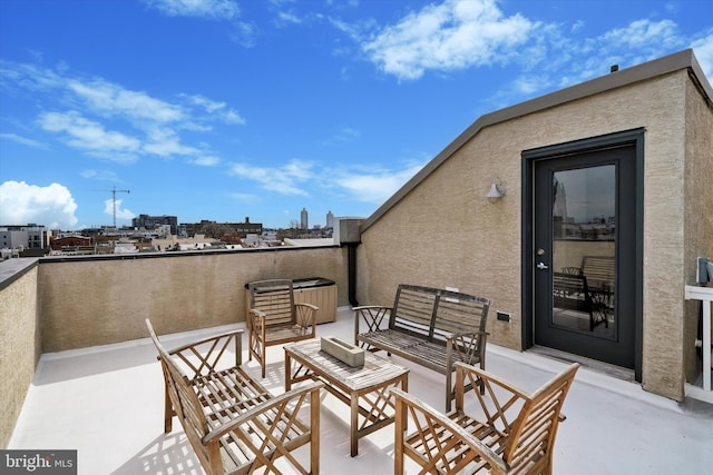 view of patio / terrace with a balcony