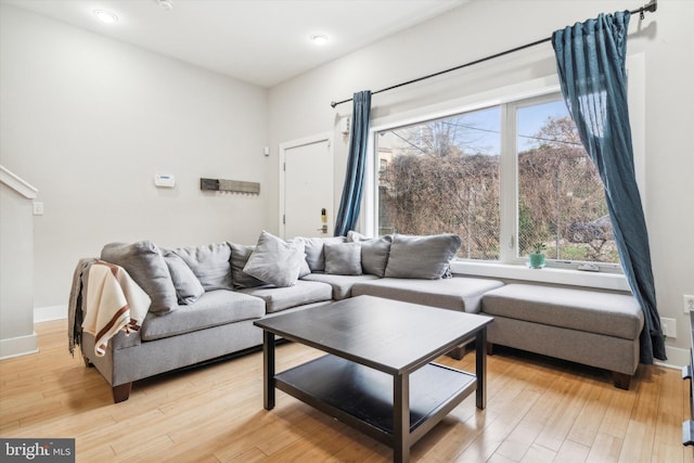 living room featuring light wood-type flooring