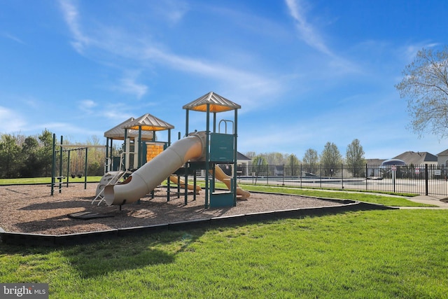 view of play area featuring a lawn