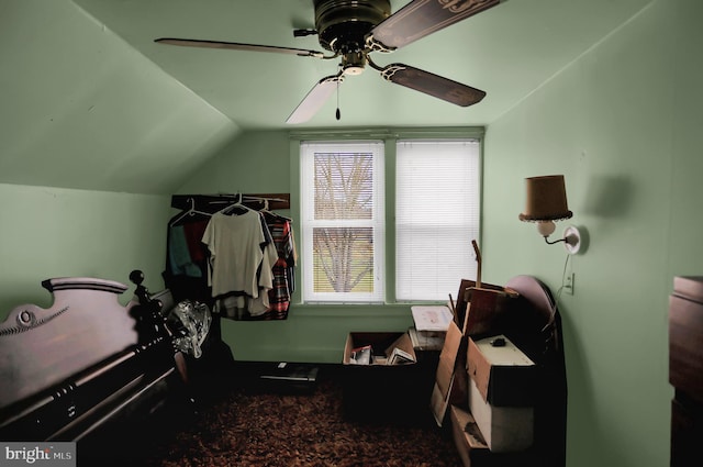 bonus room with ceiling fan and lofted ceiling