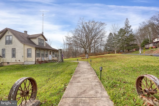 exterior space with a yard