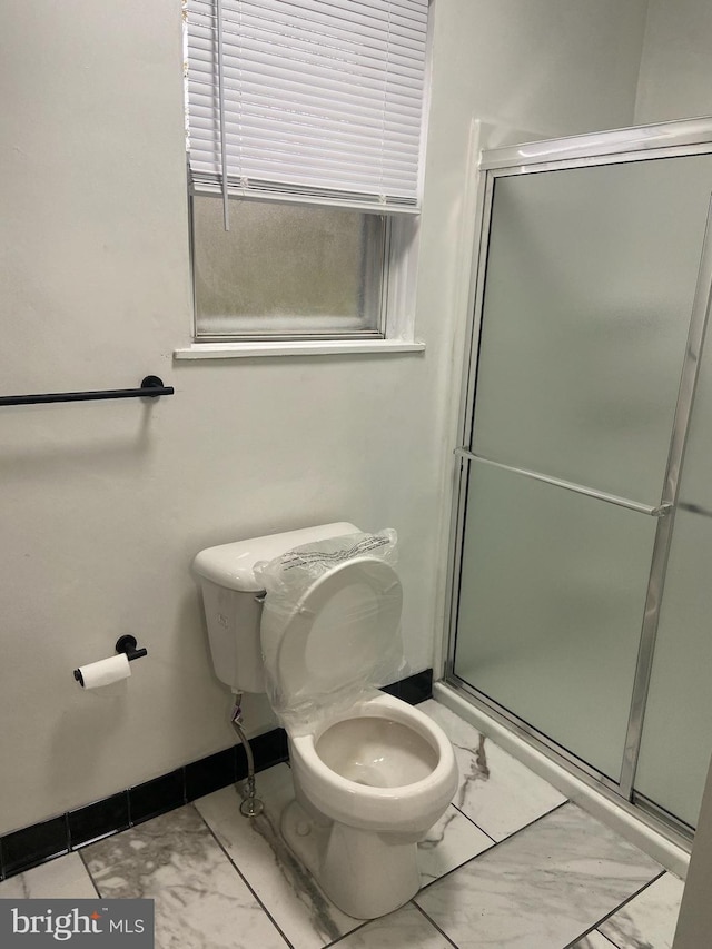 2863 Chatham St, Philadelphia, PA 19134 - full bath with toilet, a stall shower, and marble finish flooring