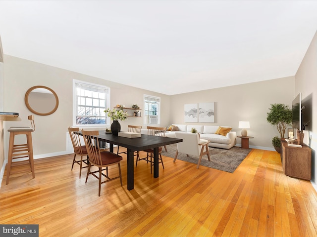 dining space featuring light hardwood / wood-style floors