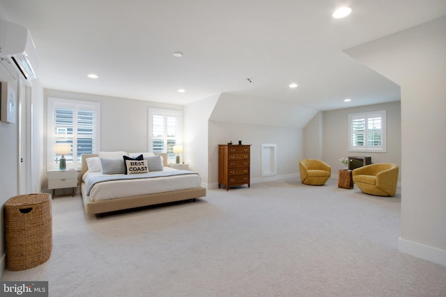 bedroom featuring a wall mounted AC, vaulted ceiling, and light carpet