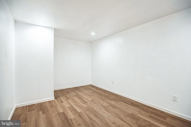 unfurnished room featuring light hardwood / wood-style floors