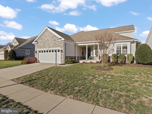 ranch-style house with covered porch, a front lawn, and a garage