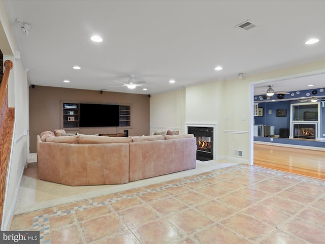 living room featuring ceiling fan