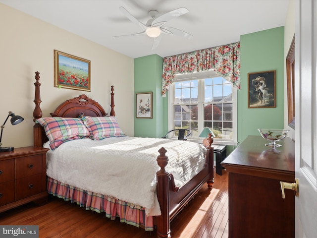 bedroom featuring ceiling fan and hardwood / wood-style floors