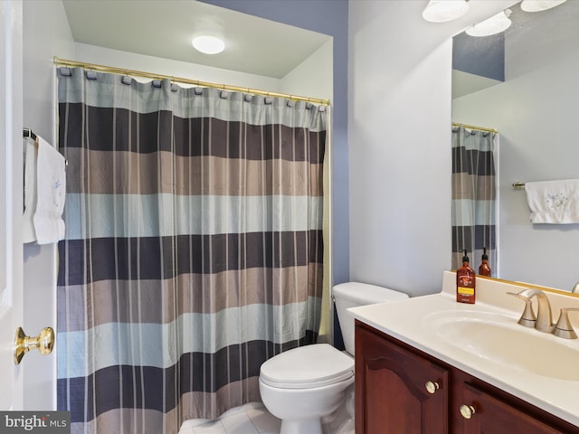 bathroom with vanity, a shower with curtain, and toilet