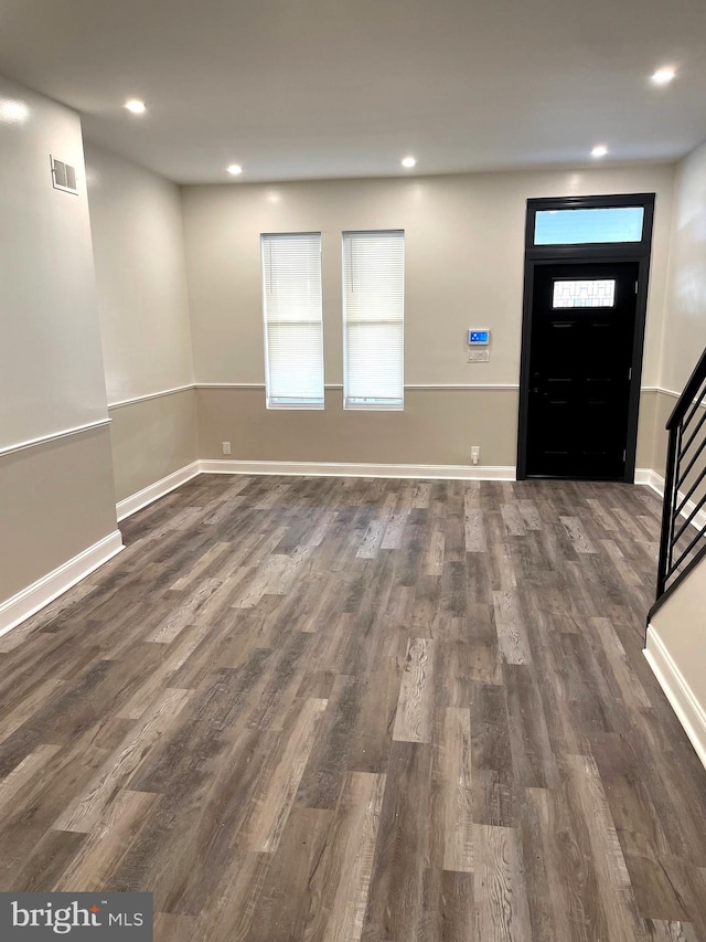 foyer featuring dark hardwood / wood-style floors