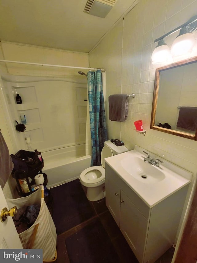 full bathroom with shower / bathtub combination with curtain, toilet, decorative backsplash, vanity, and tile walls