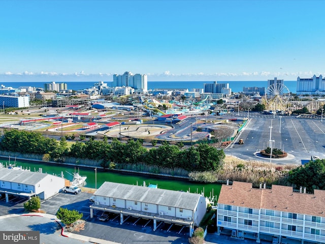 birds eye view of property featuring a water view