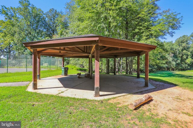 surrounding community featuring a lawn and a gazebo