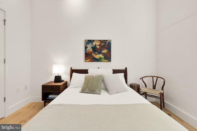 bedroom featuring hardwood / wood-style flooring