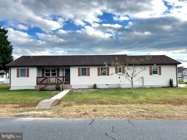 single story home with a front yard and a porch