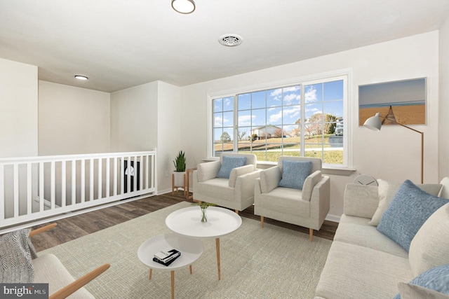 living area featuring hardwood / wood-style floors