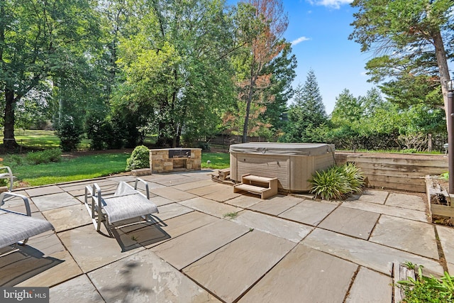 view of patio featuring a hot tub