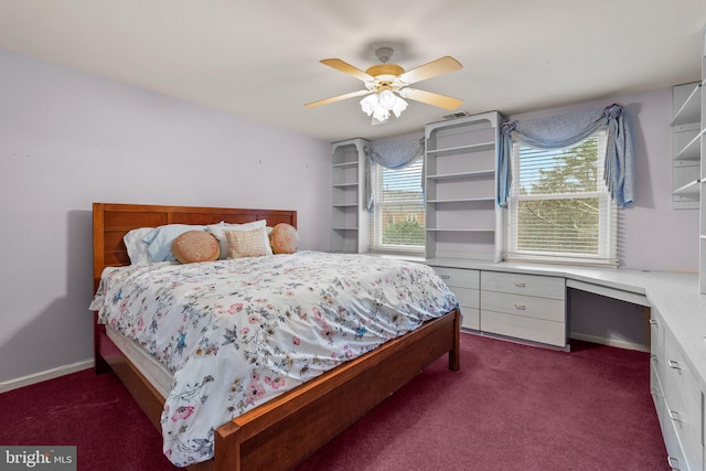 bedroom featuring dark colored carpet and ceiling fan