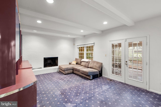 carpeted living room featuring beam ceiling, a fireplace, and french doors