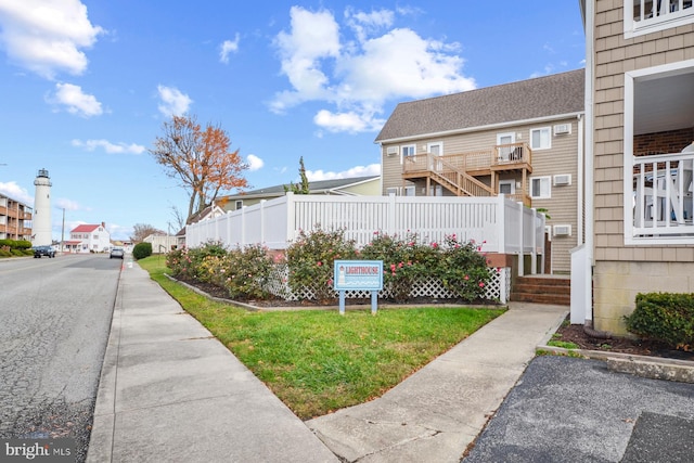 view of property exterior featuring a yard