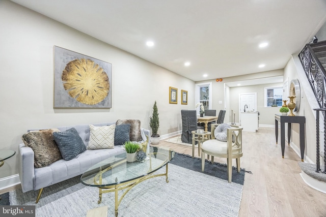 living room with light hardwood / wood-style floors