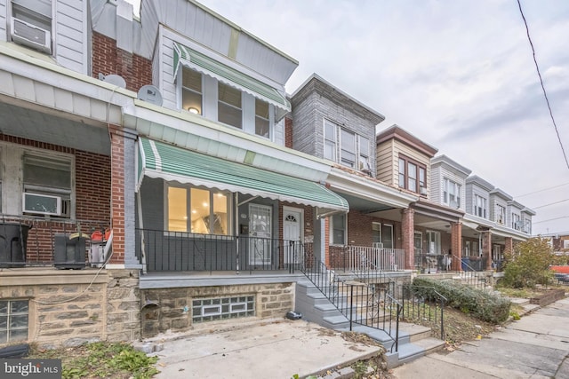 multi unit property featuring covered porch