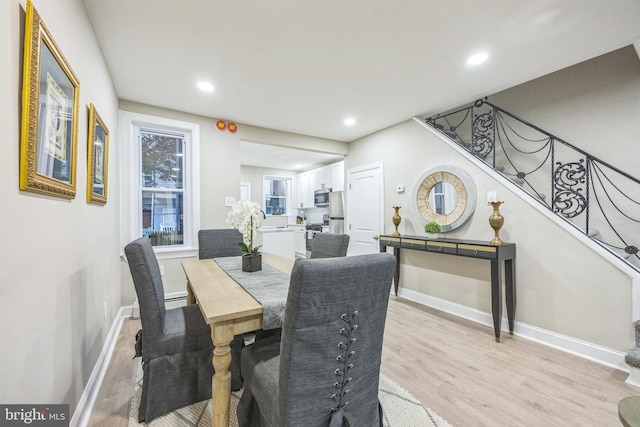 dining room featuring light hardwood / wood-style floors