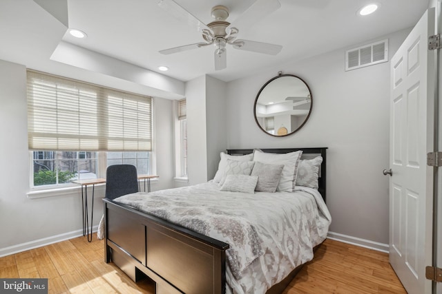 bedroom featuring ceiling fan and light hardwood / wood-style floors