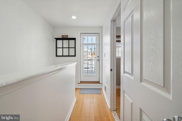 entryway with light hardwood / wood-style flooring