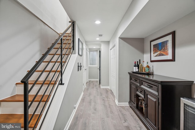 hallway featuring light hardwood / wood-style flooring