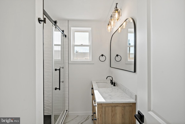 bathroom with vanity, a baseboard radiator, and an enclosed shower