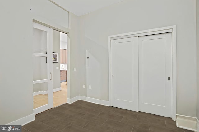 unfurnished bedroom with a closet