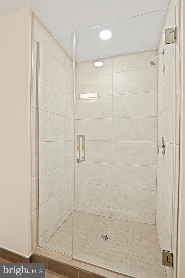 bathroom with an enclosed shower