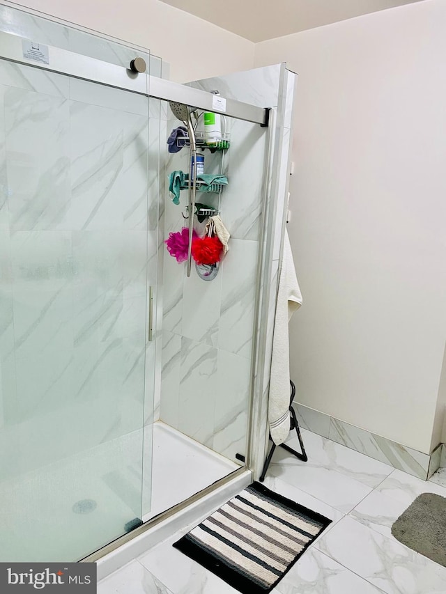 bathroom with an enclosed shower