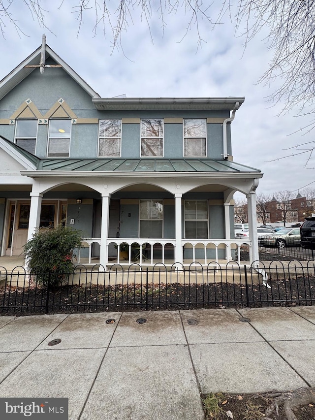 view of front of property featuring covered porch