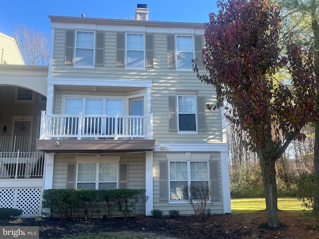 view of property featuring a balcony