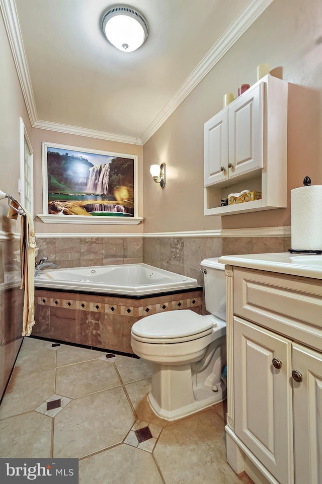 bathroom with tile patterned floors, a washtub, toilet, and ornamental molding