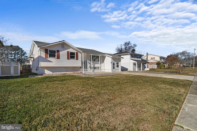 view of front of home with a front lawn