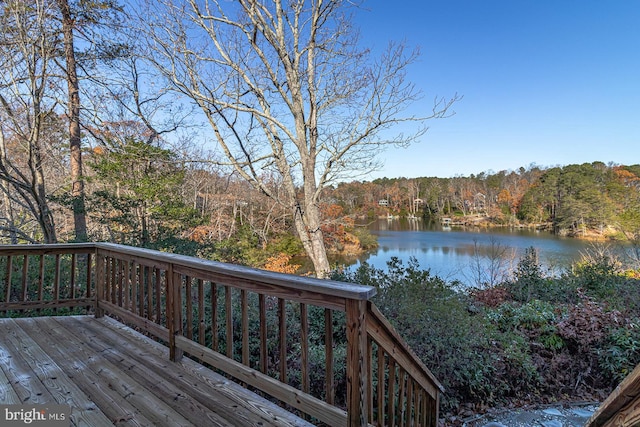 wooden terrace with a water view