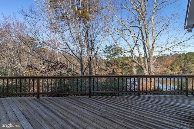 wooden terrace with a water view