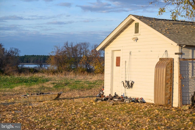 view of outbuilding featuring a water view